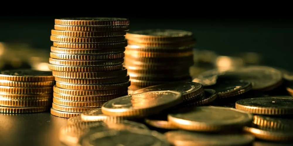 big stock pile of gold and coins