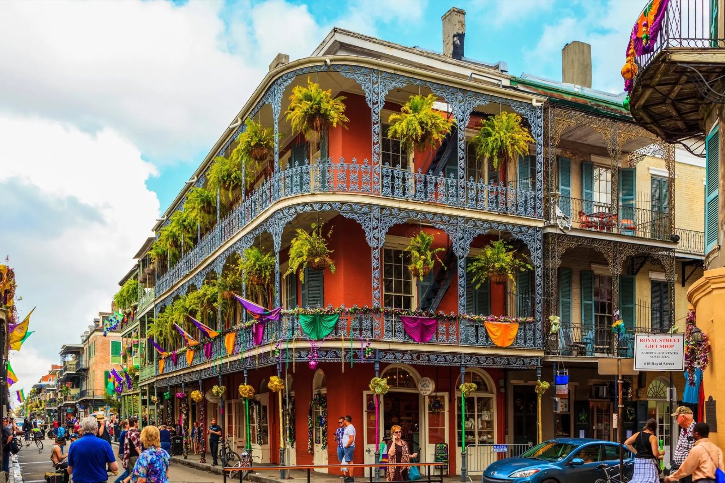 Iron balconies hung with ferns on Royal Street in the French Quarter